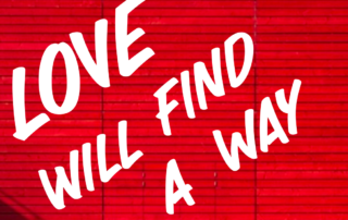 love will find a way white text on a red wall background